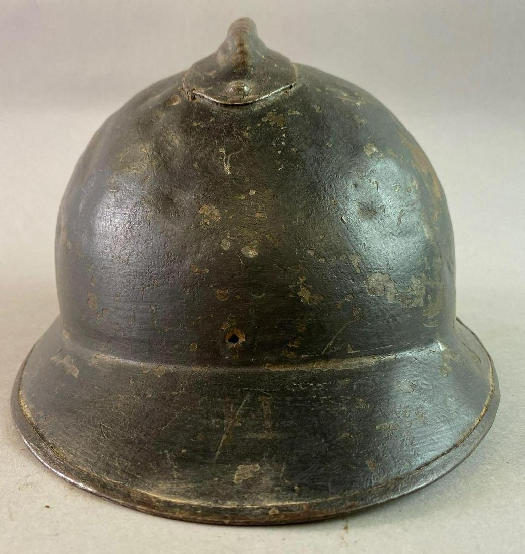 WW1 Italian M16 Adrian Helmet: Missing liner and badge.