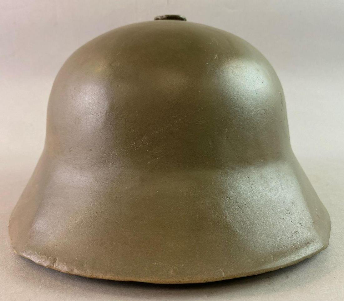 WW1 Austrian M17 Berndorfer Helmet: Dug helmet that was patched and repainted. Manufactured by Berndorfer Metallwarenfabrik Arthur Krupp A.G.