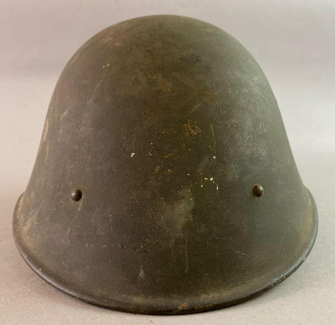 WW2 Romanian M38 Helmet: Has a German M31 liner, size 56.