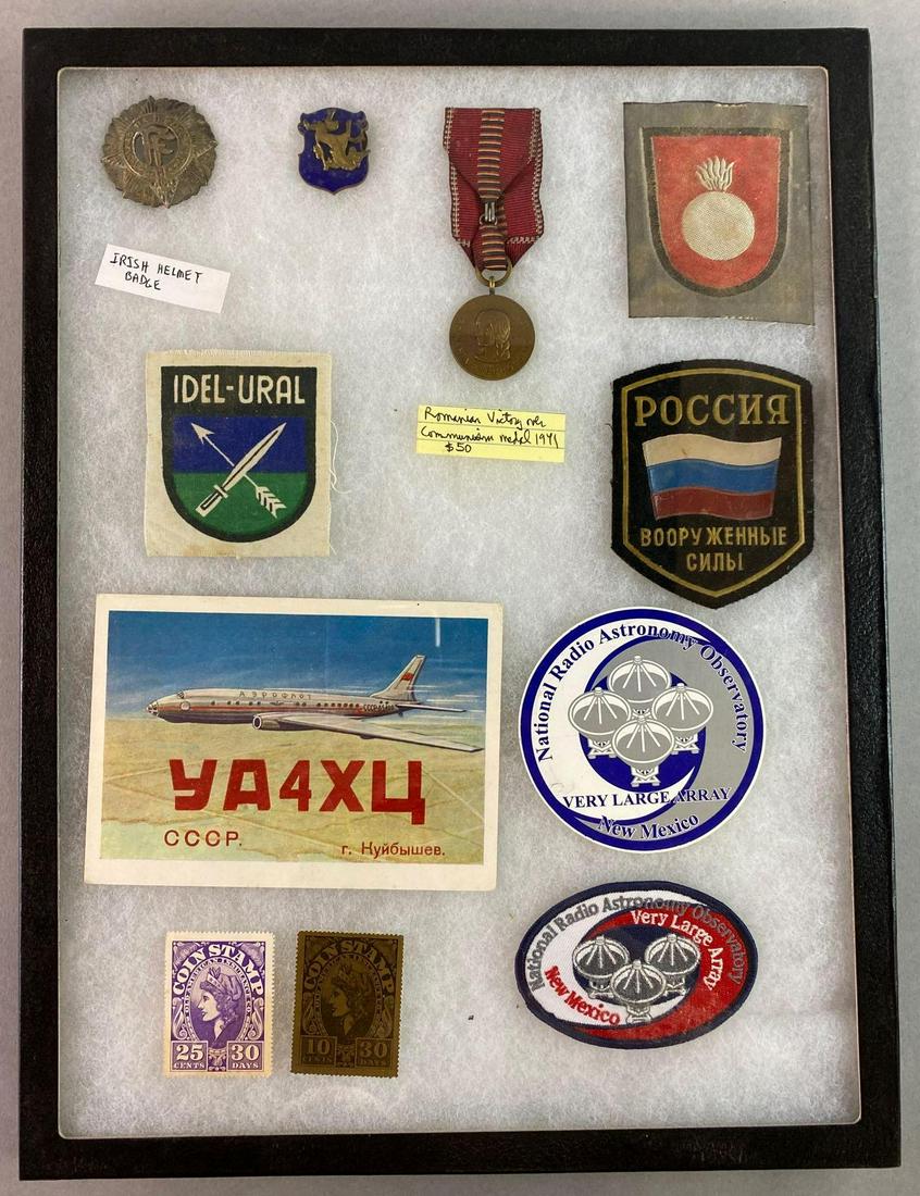 Display of Military and Civil Items.: Includes 1941 Romanian Victory Over Communism Medal, an Irish helmet badge, Russian patch, and more.