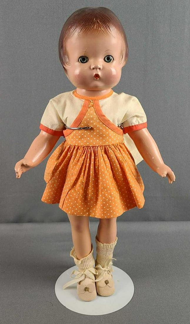 Effanbee Composition Patsy doll with sleep eyes: 15 inches tall. One leg is replaced or refinished. Some crazing. Joints are tightly strung. Body marked Patricia