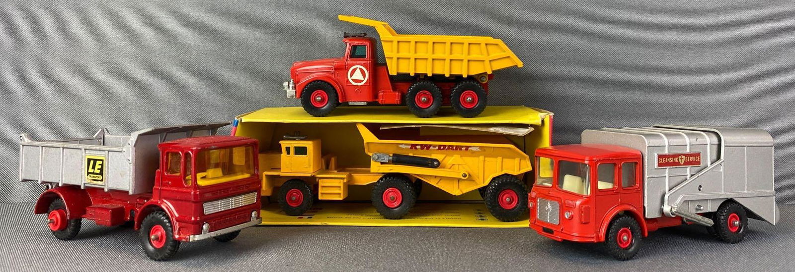 Group of 4 Matchbox Die-Cast Trucks: Includes Leyland Tipper, Refuse Truck, K W Dart Dump Truck and Scammell Tipper Truck