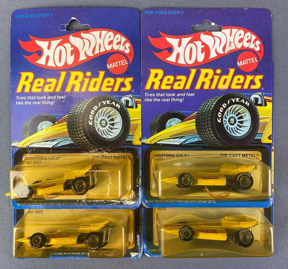 Group of 4 Mattel Hot Wheels Lightning Gold Real Riders: #4372, die-cast, in original packaging, 1983