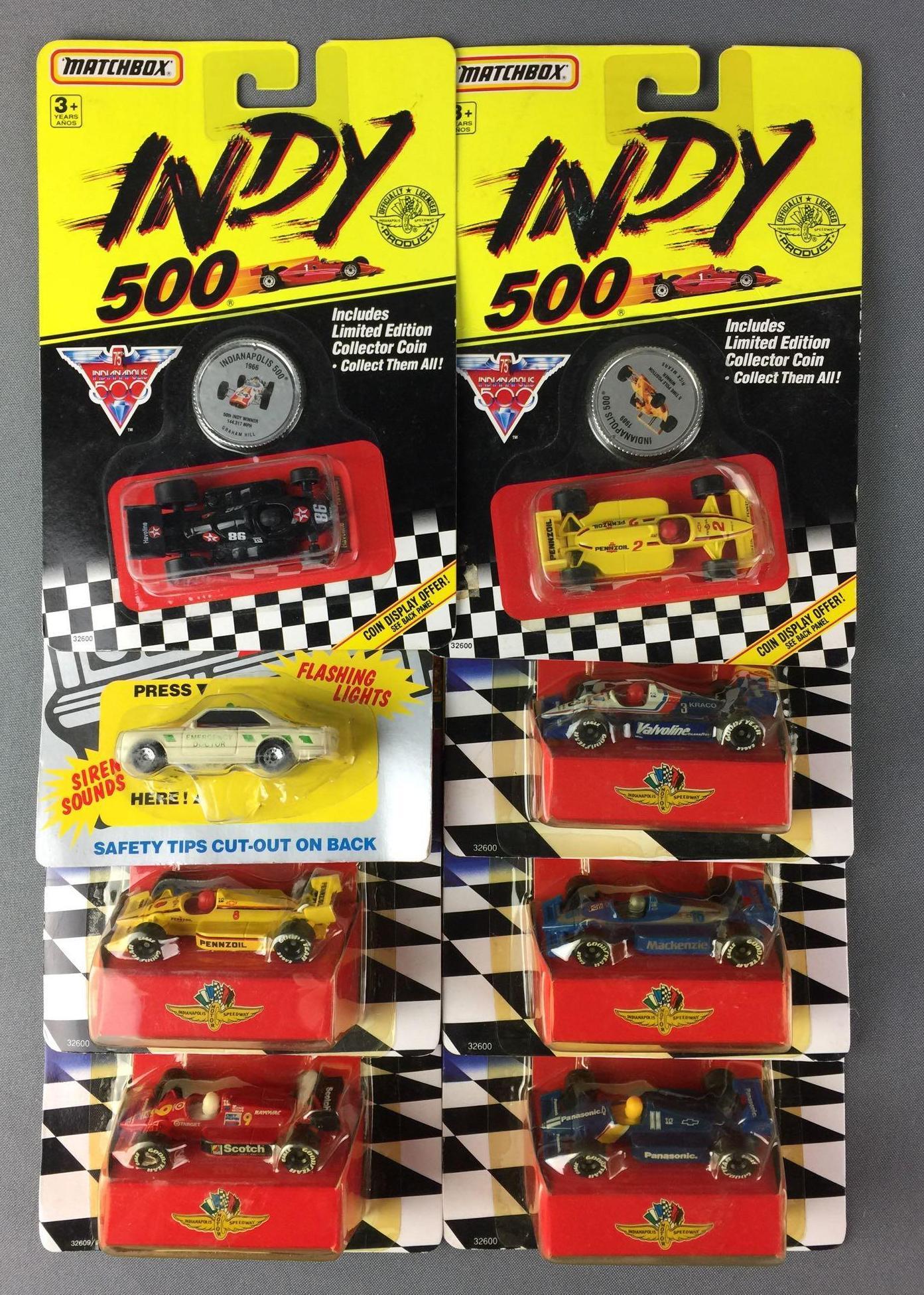Group of 6 Matchbox Die-Cast Vehicles: All in original packaging, includes Indy 500 and Rescue 911, 1990s