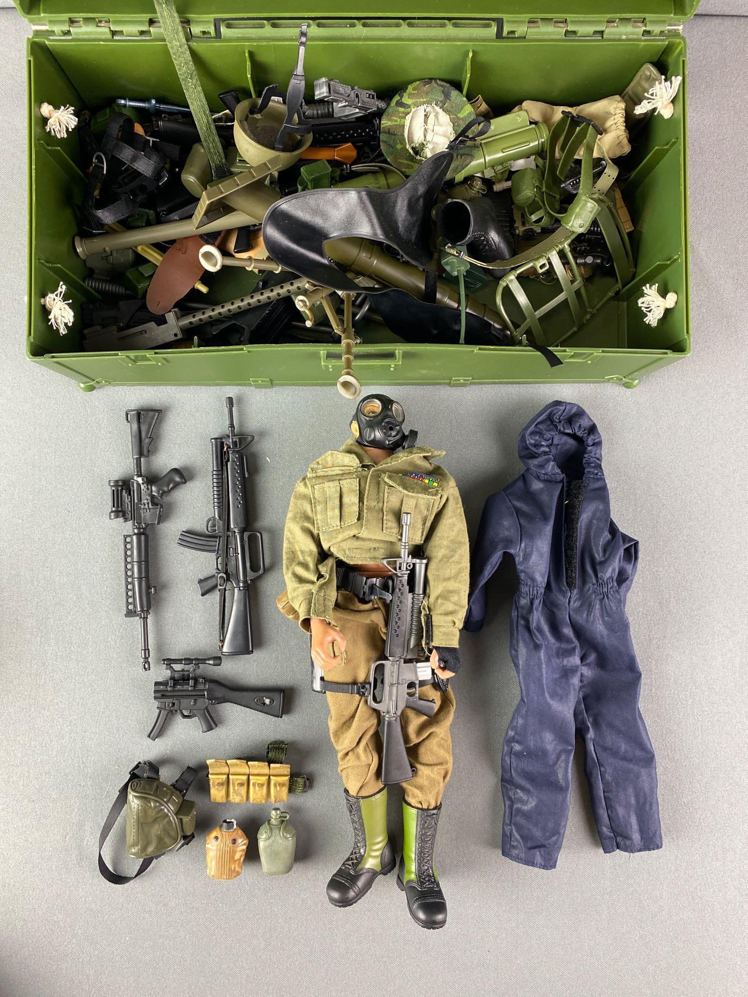 G. I. Joe with Accessories and Case: Includes hats, clothes, guns, and more.