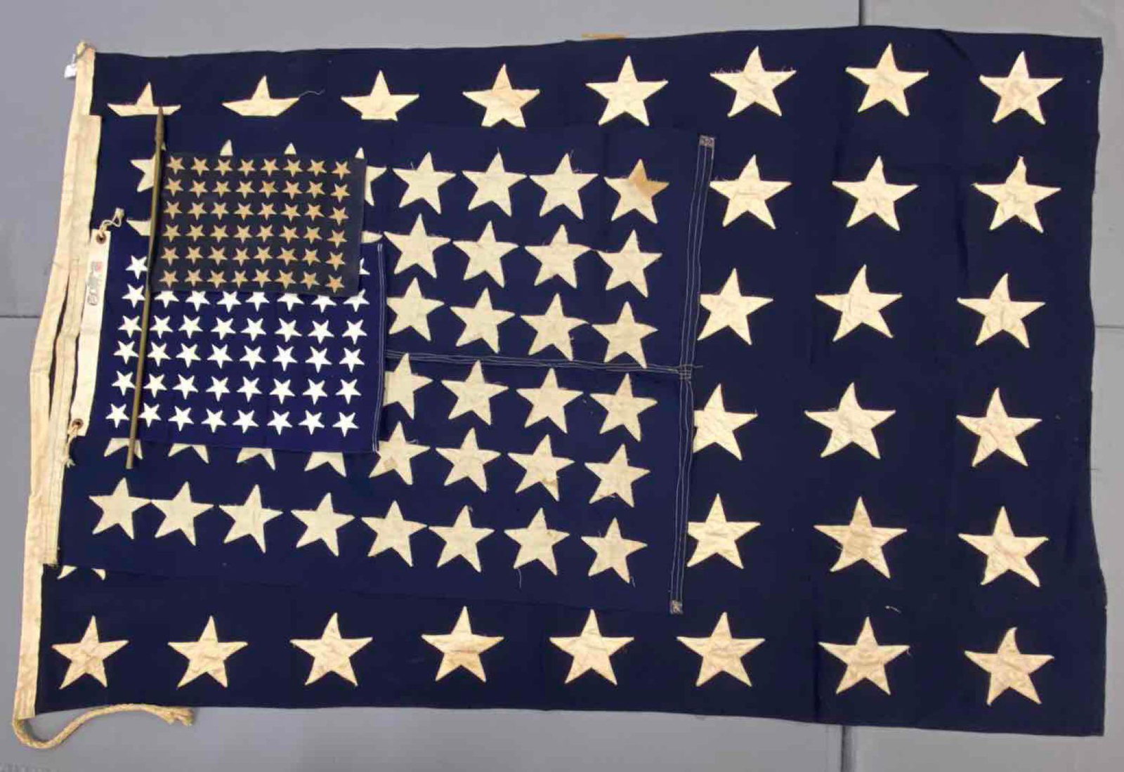Group of 4 48 Star Naval Union Jack Flag: Measures 78 x 54 inches. There is some staining and damage.