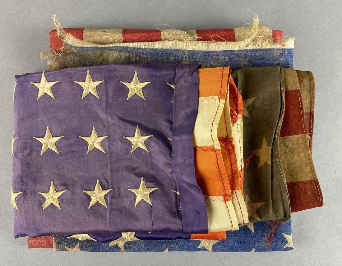 Group of 3, 48 Star Flags: Largest measures 19 x 35 inches. Each has fading and some damage.