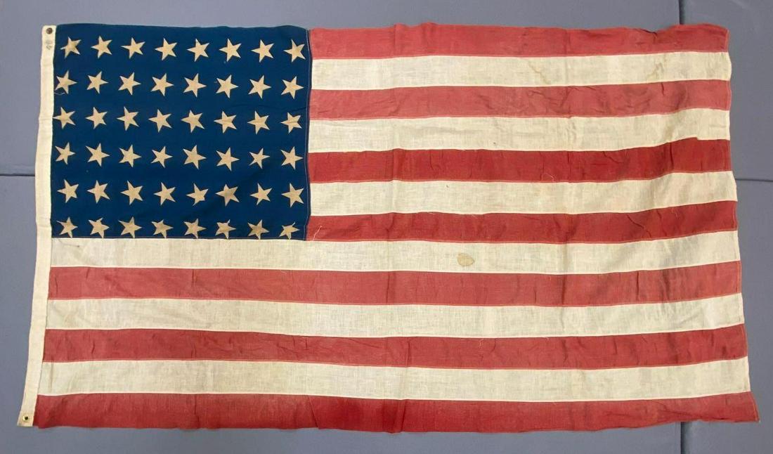 Vintage 48 Star Flag: Measures 41 x 74 inches. Has some staining and holes.