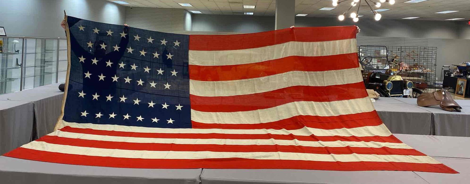 Large 45-Star US Flag: 166x123 inches, machine sewn cotton, individual stripes, applique stars, some holes