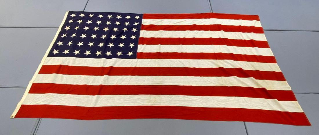 Large 48-Star American Flag: Measures 9x5 ft. 2 grommet hoist. Minimal stains, very good condition.