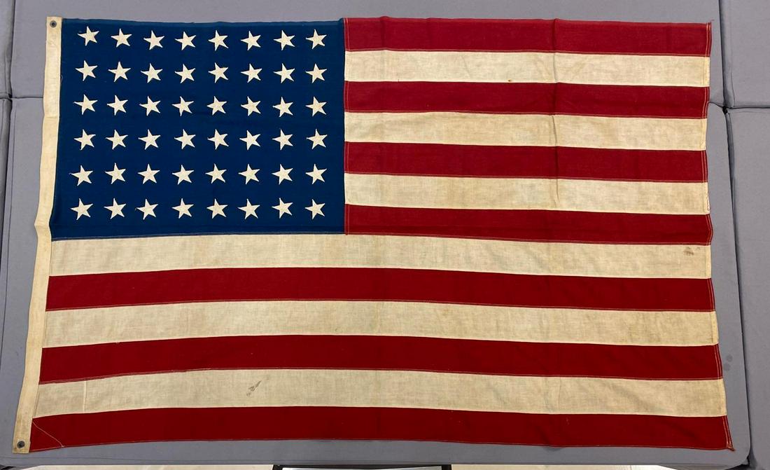 48-Star US Flag: 67.5x42.5 inches, machine sewn cotton, individual stripes, applique stars