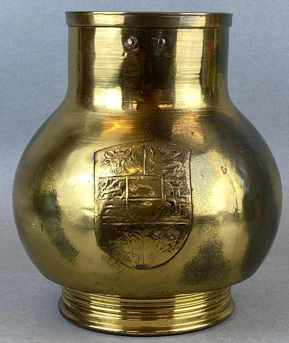 Brass Container with Embossed Crest: Bottom of crest pulling up, some tarnishing and dents. Measures 9.5in tall
