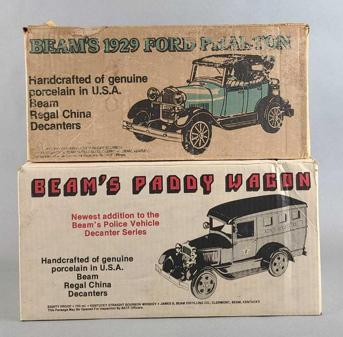 Jim Beam vehicle decanters: 1929 Ford Phaeton, Paddy Wagon. Both have original boxes. Dusty, displayed condition