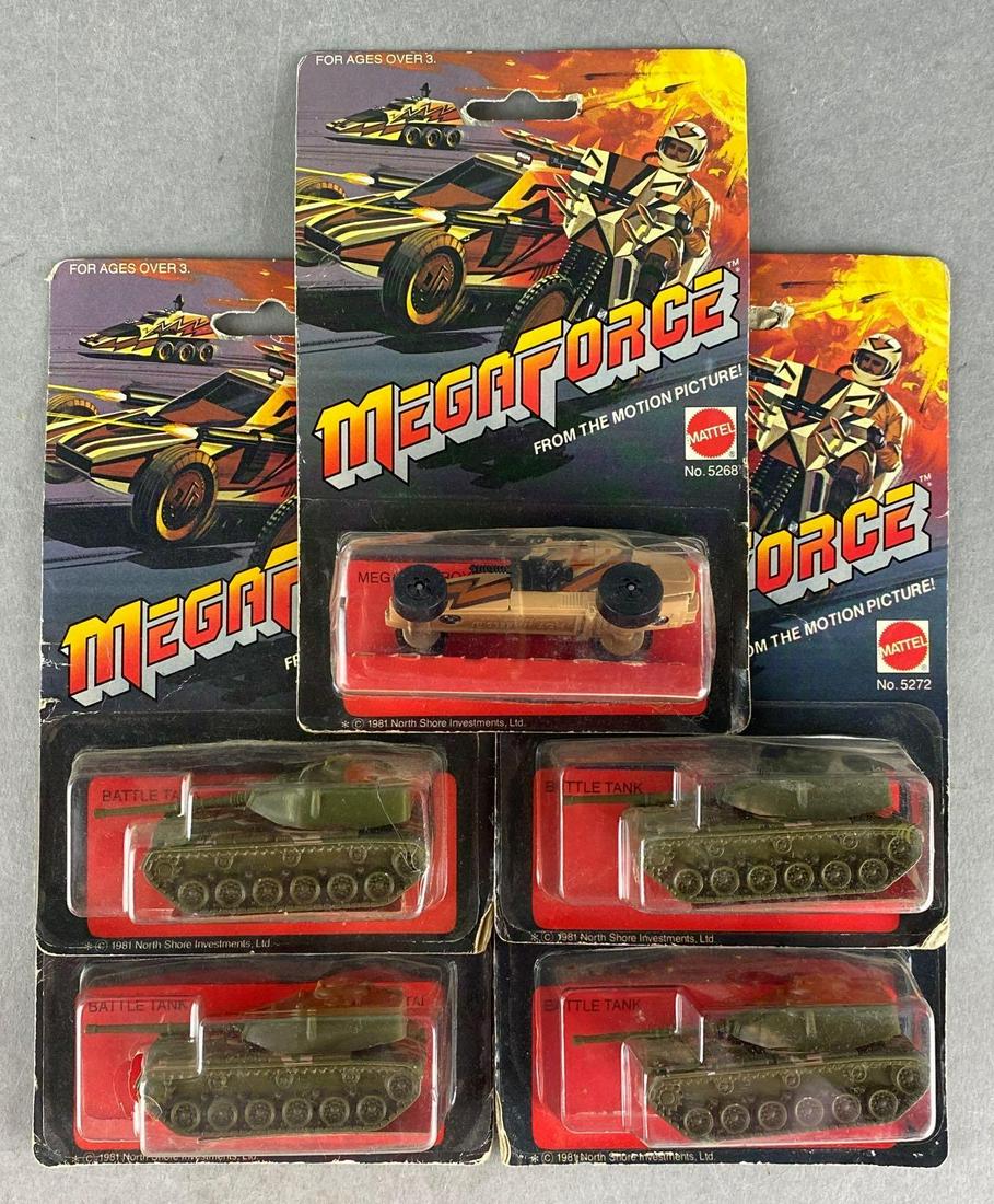 Group of 5 Mattel MegaForce die-cast vehicles: (4) Battle Tank and (1) Megadestroyer. In original packaging, some wear. Mattel, Inc