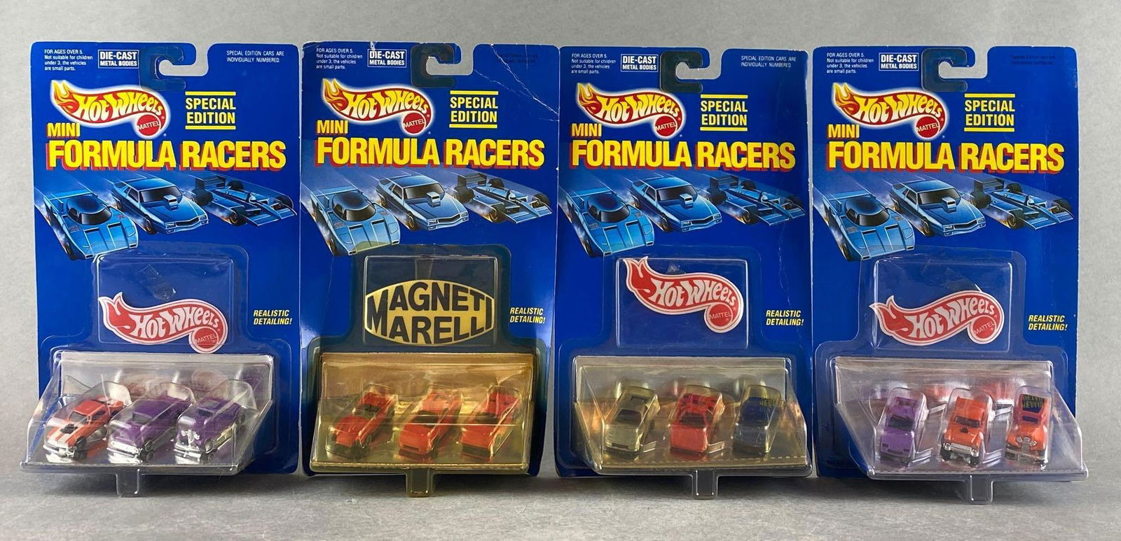 Group of 4 Hot Wheels Mini Formula Racers due-cast vehicle sets (1 of 4)