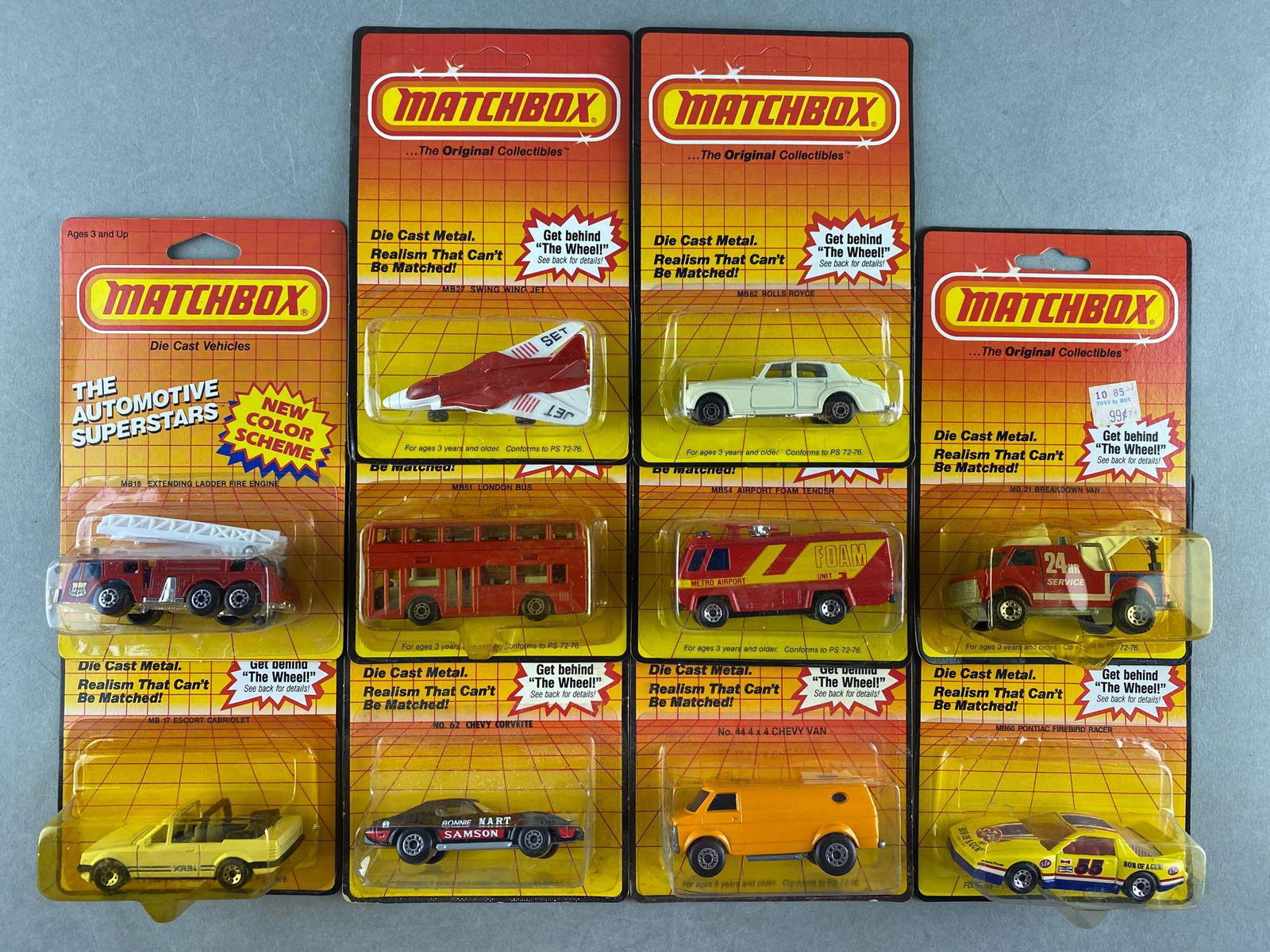 Group of 10 assorted Matchbox die-cast vehicles: No. 62 Chevy Corvette, No. MB60 Pontiac Firebird Racer, No. MB 17 Escort Cabriolet, and more. New in original packaging