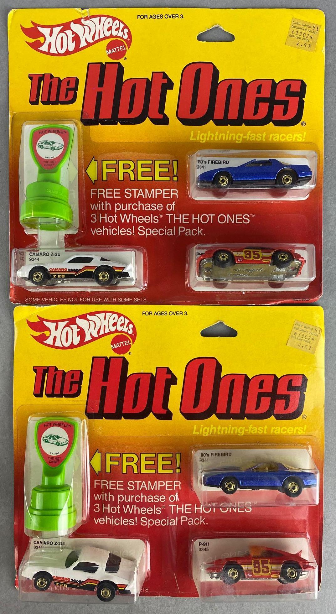 Group of 2 Hot Wheels The Hot Ones die-cast vehicle sets with bonus: 3-piece sets with bonus stamper, new in original packaging, some wear