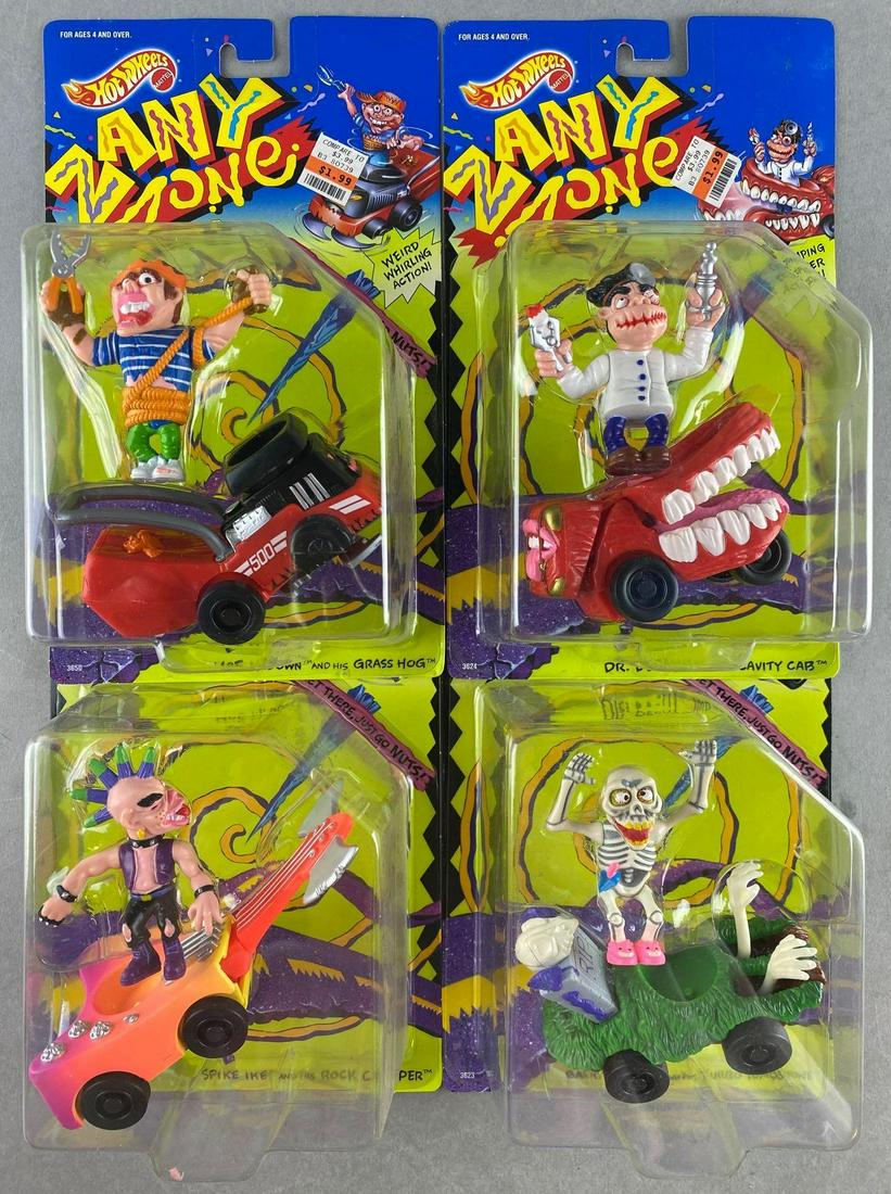 Group of 4 Hot Wheels Zany Zone figure and vehicle sets: Spike Ike and his Rock Chopper, Barry Dalive and his Turbo Tombstone, Dr. Decay and his Cavity Cab, and More M. Down and his Grass Hog. New in original packaging