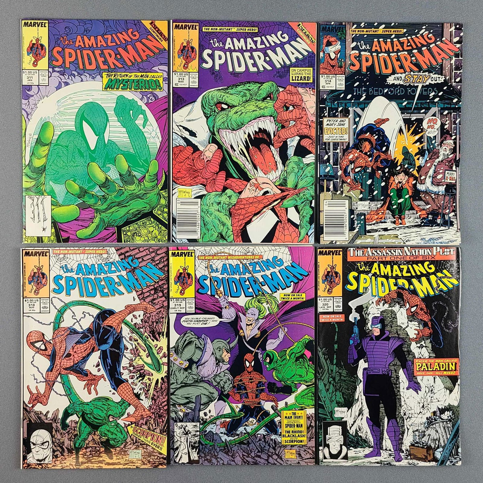 Group of 6 Marvel Comics The Amazing Spider-Man Comic Books: Includes No. 311, 313, 314, 318-320. Lot of 6 Higher Grades. Cover art by Todd McFarlane featuring Mysterio. Cover art by Todd McFarlane featuring The Lizard. January, March, April, August-September 1