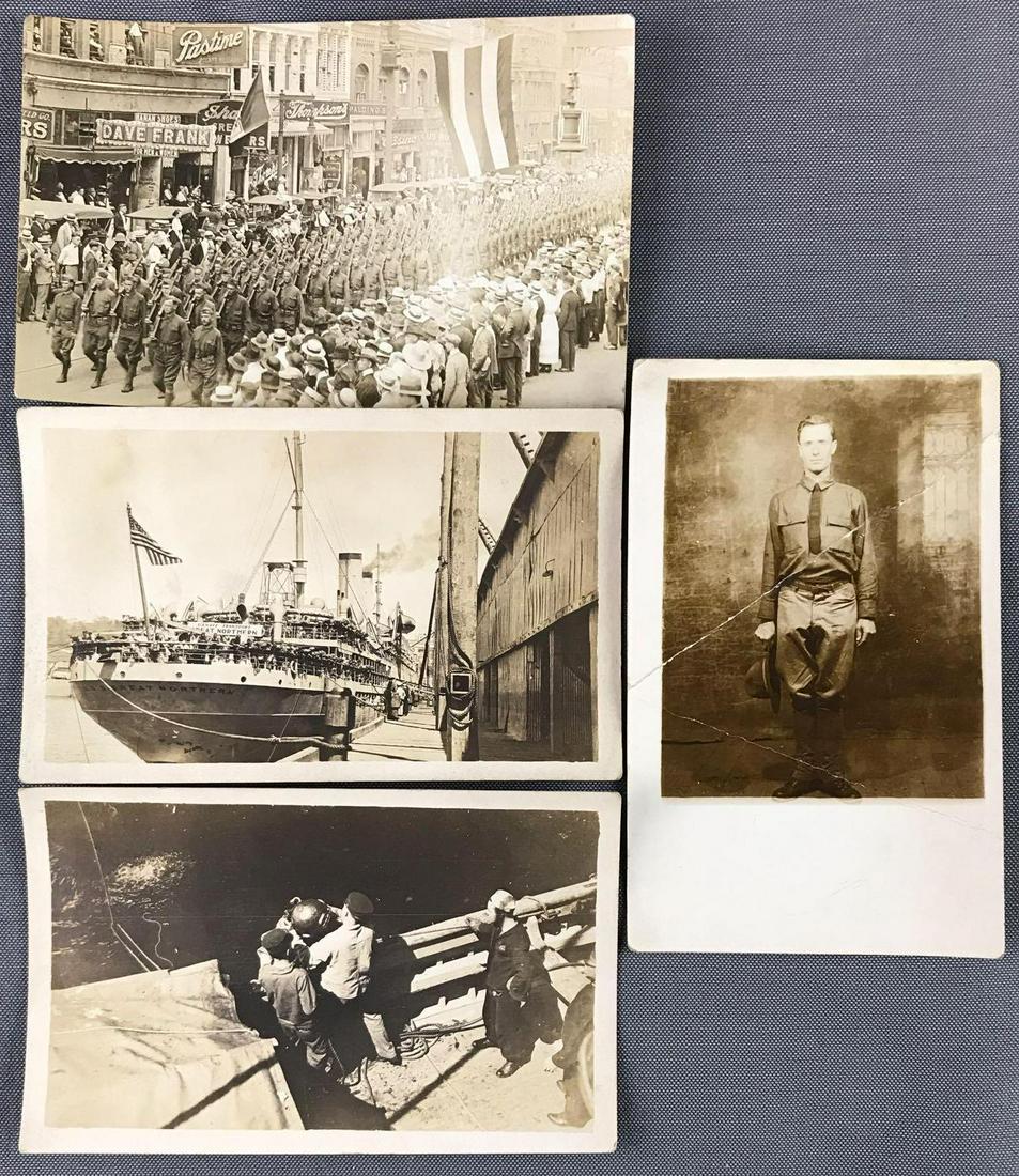 Postcards - Real Photo Military: Group of 12 includes soldier in dress blues uniform, diver coming up from water, soldiers marching down street, 111th Engineers Dallas, Texas and more.