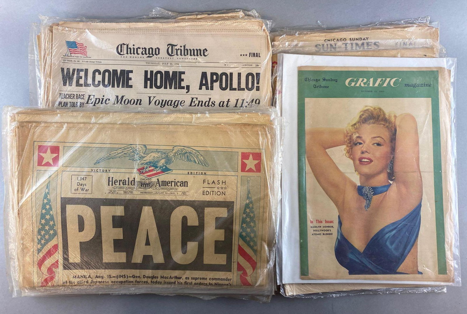 Group of 16 Chicago Newspapers: Includes headline about WW2 Victory, Apollo11 lunar landing, Marilyn Monroe, and more.
