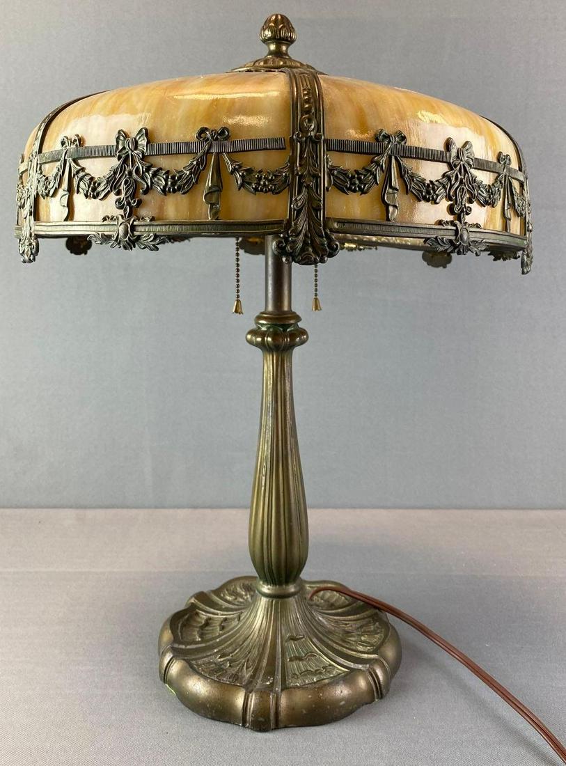 Antique Slag Glass Table Lamp: in working condition, some cracks throughout the shade, metal base, 20 1/2 inches tall, 16 inch diameter shade