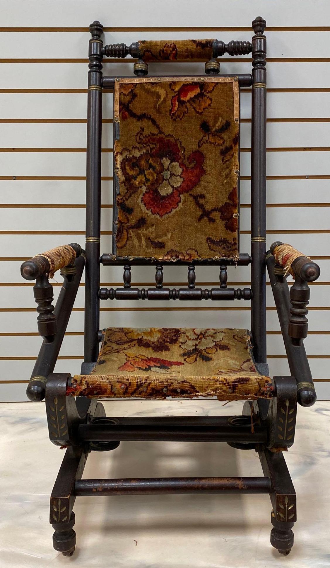 Antique Wood Rocking Chair: 42 3/4 x 22 x 22 1/2in, fabric worn thin, some tears, wood stains and scratches. No Shipping.