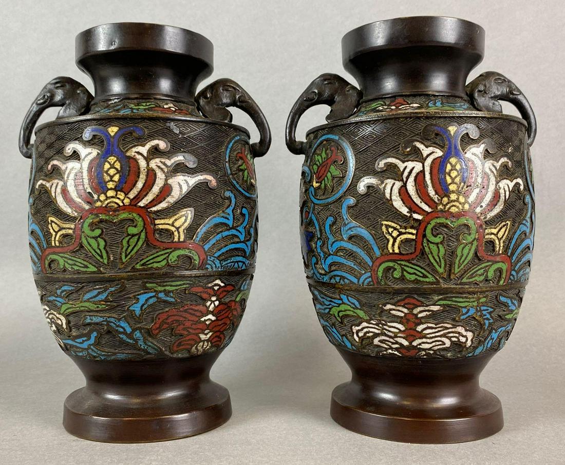 Pair of Japanese Champleve Elephant Handled Vases: Measures 9 x 6 inches. The is some damage to the feet.