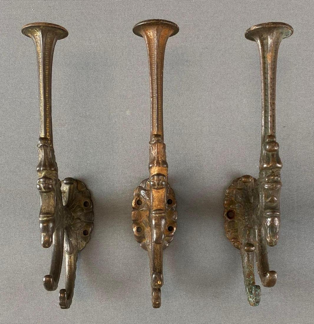 Group of 3 Cast Iron Coat Hangers (1 of 5)