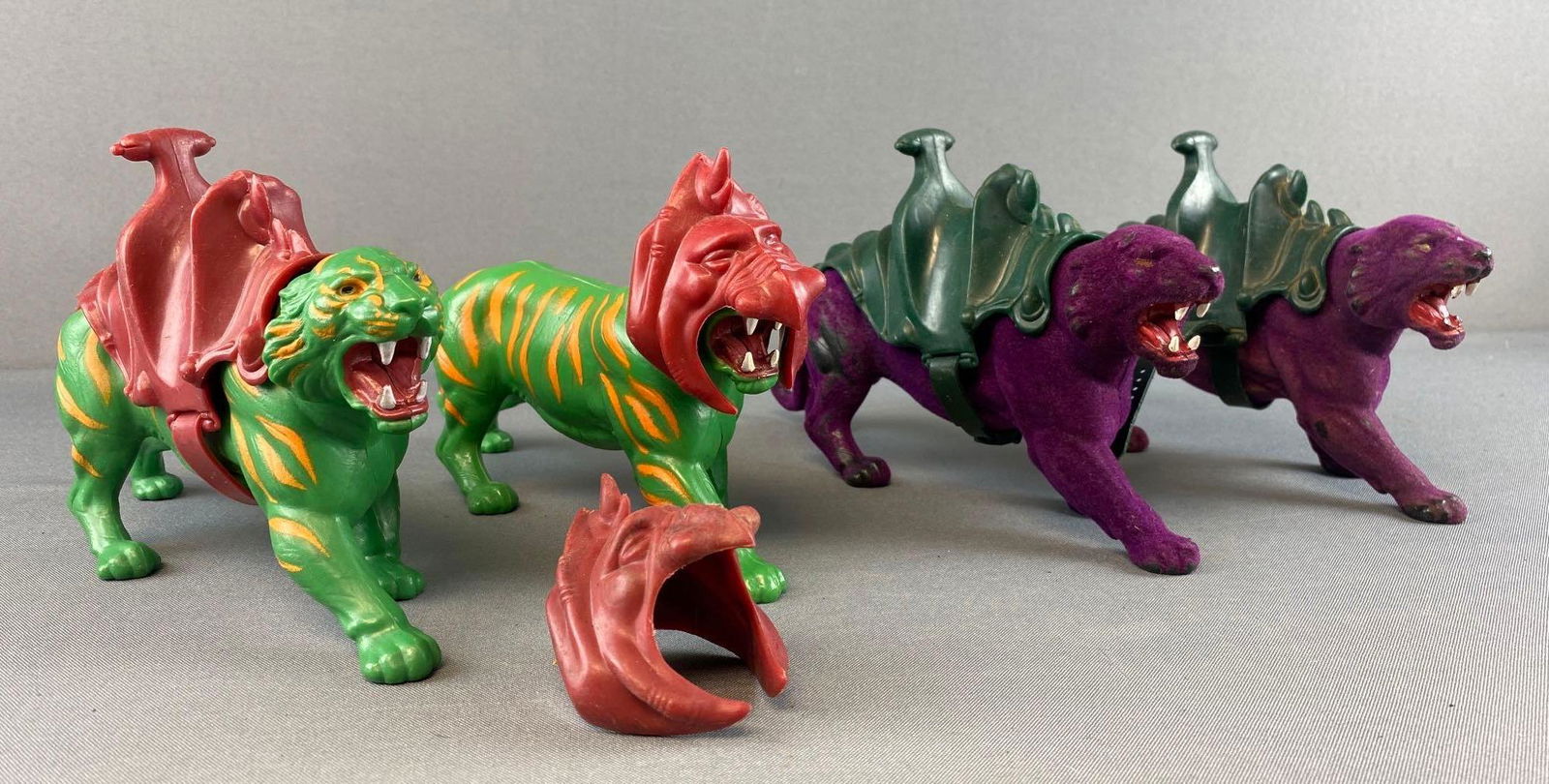 Group of 4 He-Man Battle Cats and Panthor Action Figures: Includes some armor. Played with condition.