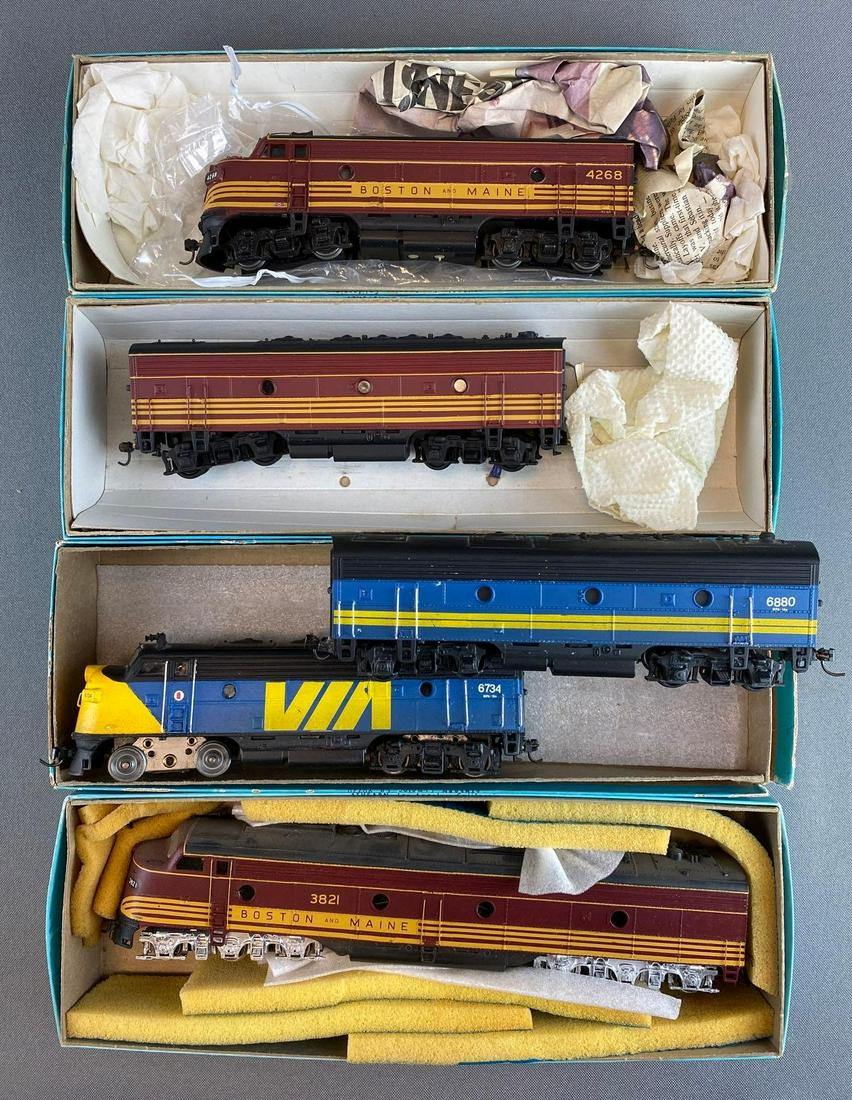 Group of HO Scale Diesel Locomotives and Train Cars: untested, with boxes. Includes BM 3821, 4268, and 4267, VIA 6734