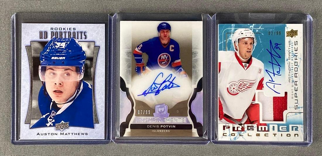 Group of 3 2016-17 Upper Deck Hockey Cards: Including Rookies UD Portraits #P110 Auston Matthews, Premiere Super Rookies #SSRMA Anthony Mantha Auto Patch 2/99, and The Cup Enshrinements #EDP Denis Potvin Auto 7/99, all sharp cards.