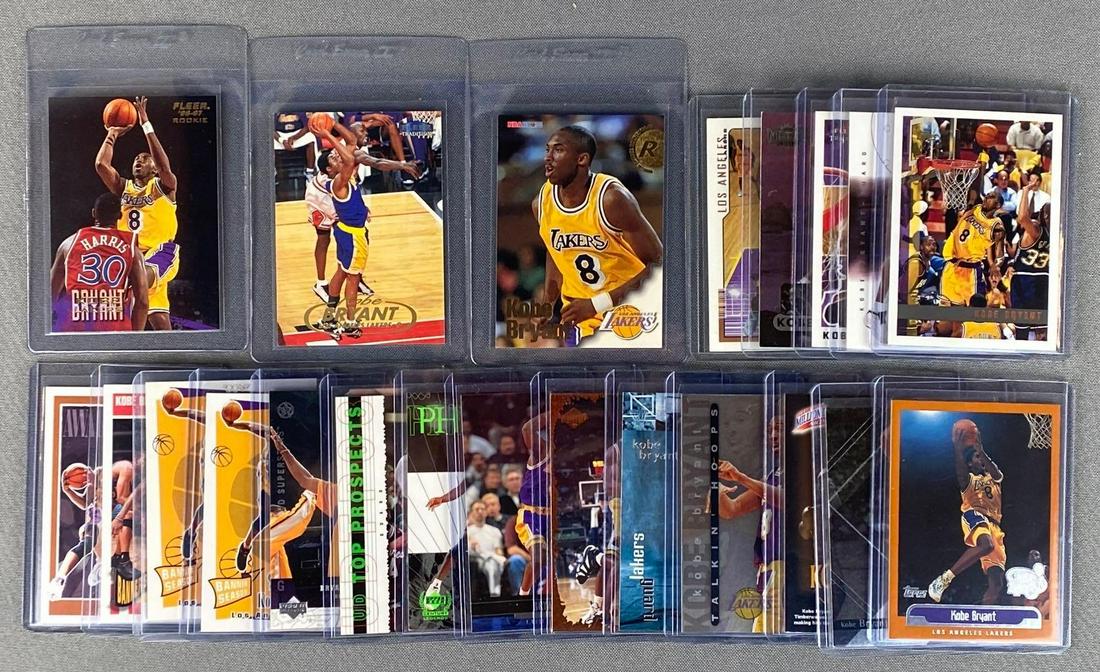 22 Kobe Bryant Cards with Rookies: Includes rookies and inserts, including 1996 Fleer #203 Rookie, 1996 NBA Hoops #28 Rookie, 1997 Metal #86, 1998 Fleer Tradition #1 with Jordan, 1997 Topps #171, 1999 a Topps #125, and much more.