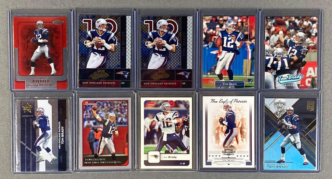 Group of 10 Tom Brady Football Cards: Including (2) 2002 Playoff Absolute #134, 2006 Topps Finest Red #105, 2002 Leaf Rookies & Stars, and more, ready to grade.