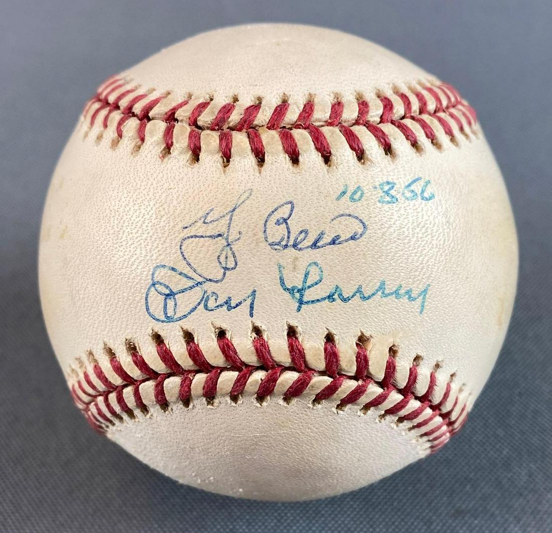 Don Larsen and Yogi Berra Signed Baseball: In display case. With National Memorabilia Supply Co. COA, date on ball 10/8/56 World Series Perfect Game