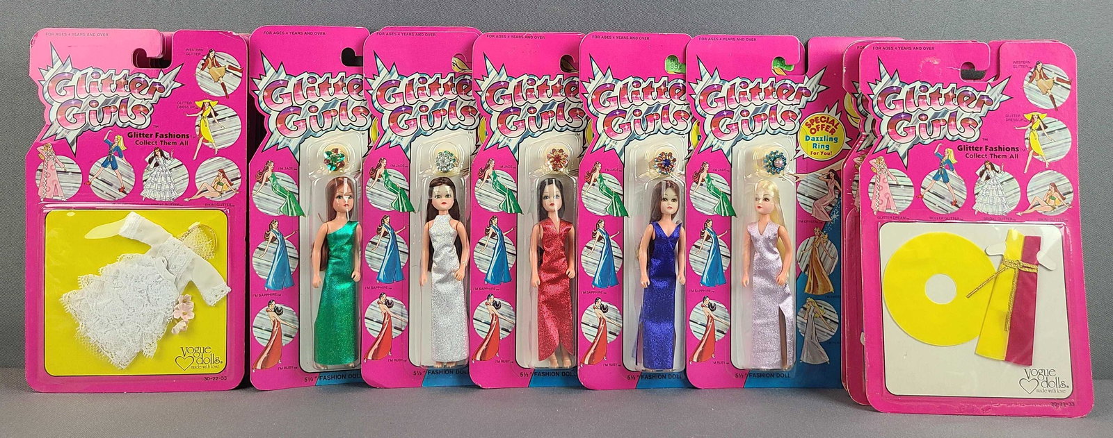Group of Glitter Girls and Fashions: Vogue dolls, circa 1982 Lesney. Sealed in original packaging