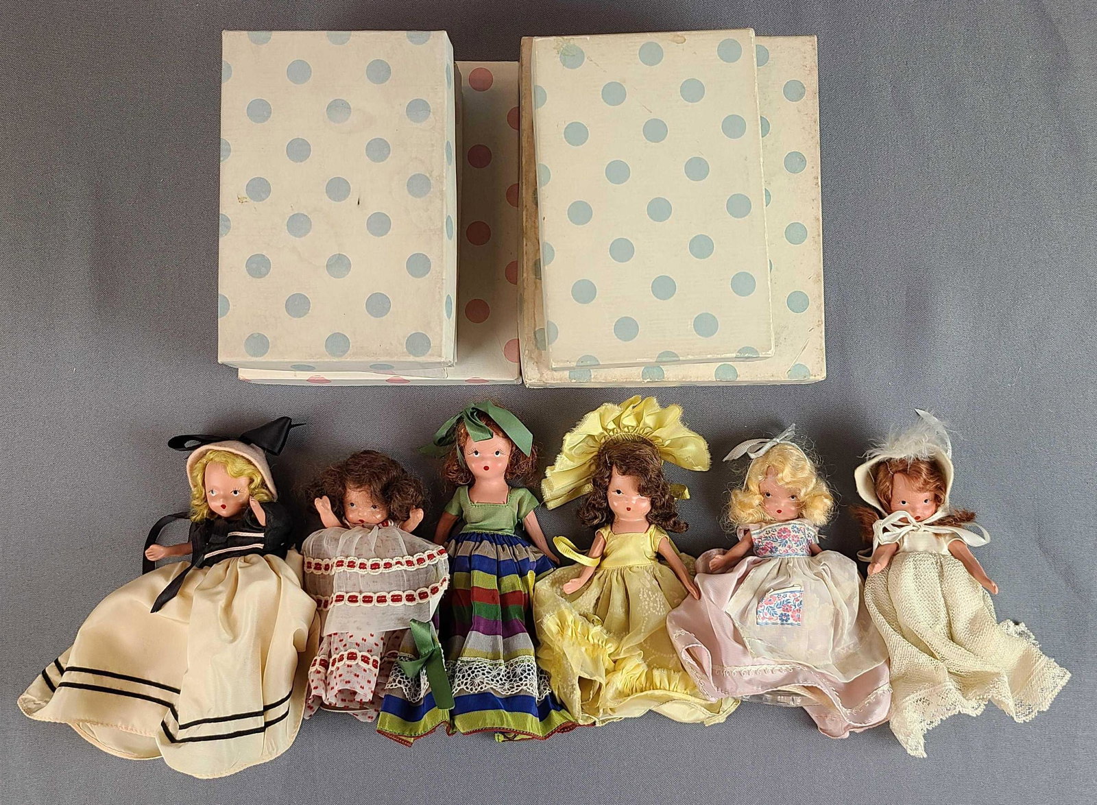 Group of 6 Bisque Nancy Ann Storybook Dolls: Boxes do not match dolls.