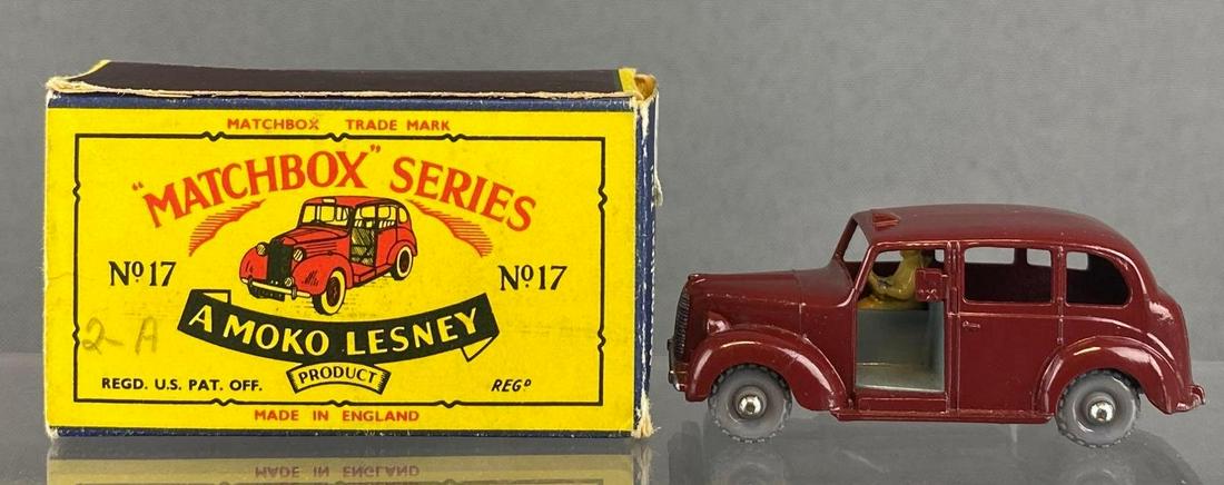 Matchbox No. 17 Metropolitan Taxi: Burgundy. A Moko Lesney Product. Gray plastic wheels. Original box. Made in England. Die-Cast.