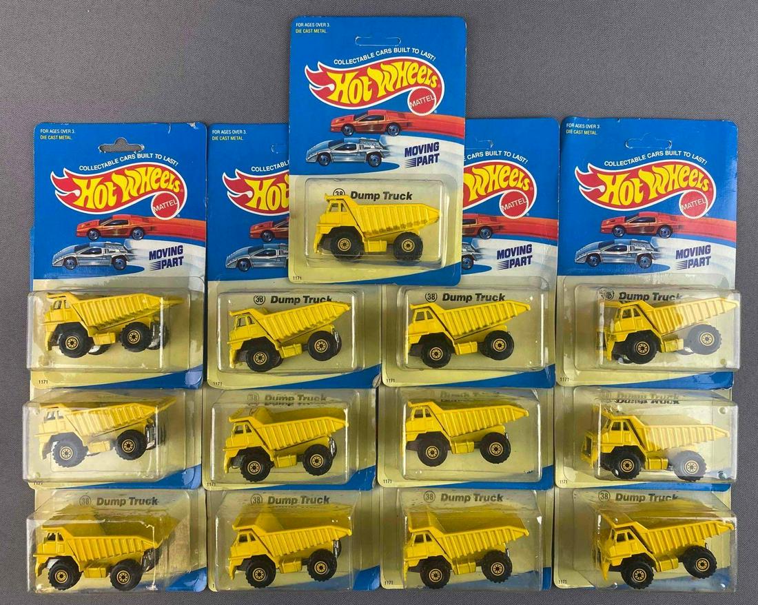 Group of 13 Hot-Wheels No. 38 Dump Truck Die-Cast Vehicles: Mattel. 1988. New in original packaging. Some punched.