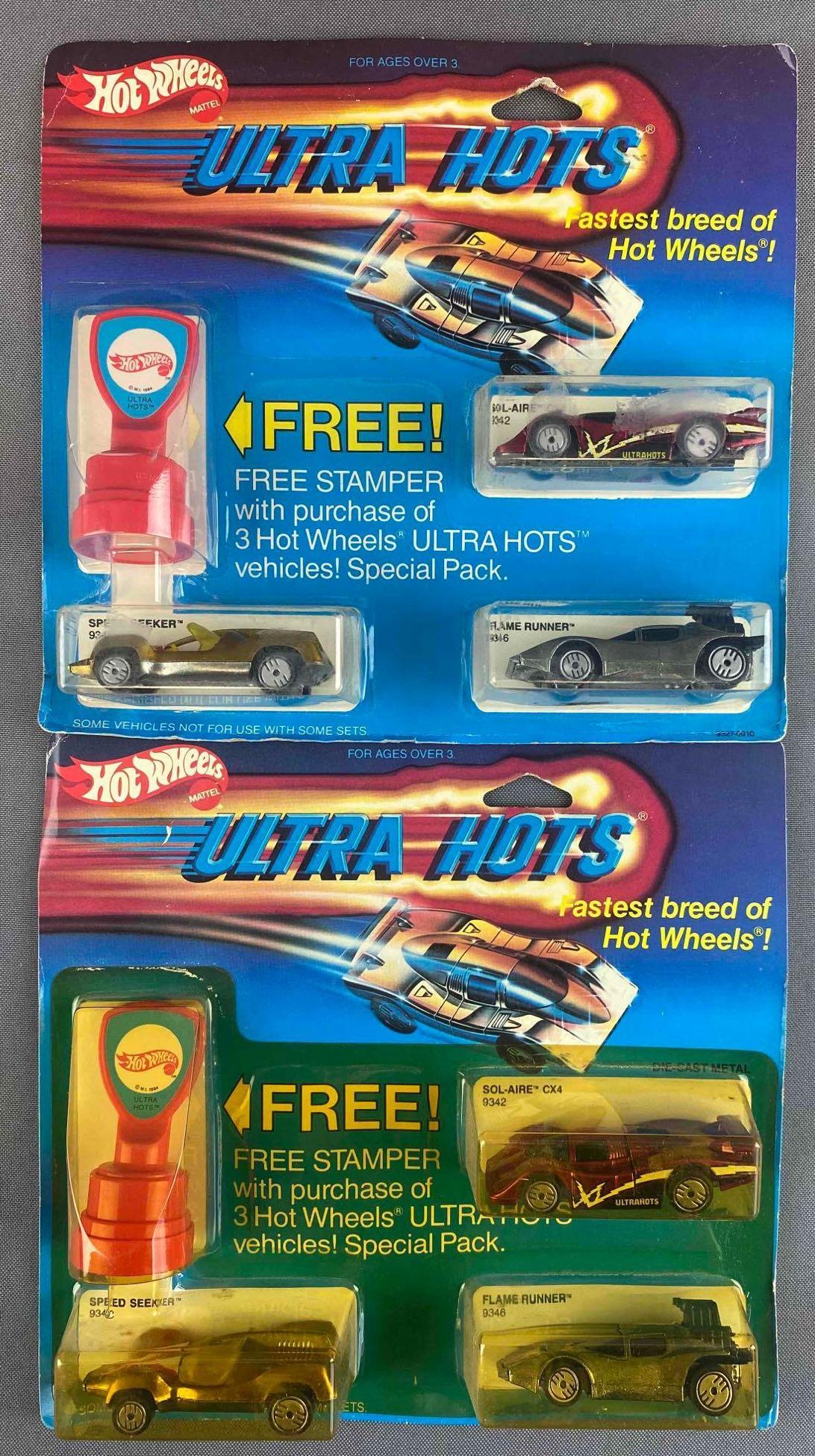 Group of 2 Hot Wheels Ultra Hots with Stamper Die-Cast Vehicles: Mattel, 1984. New in original packaging. Some water and sun damage. Punched.
