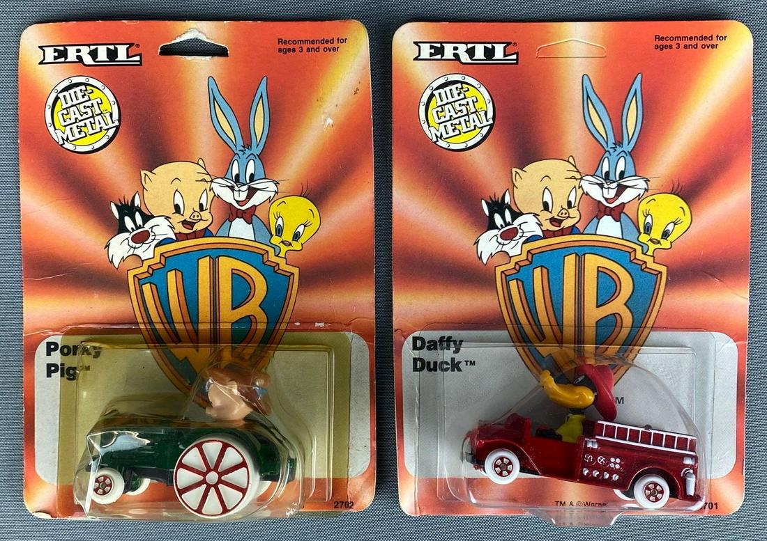 Group of 40+ ERTL Looney Tunes Die-Cast Vehicles: 1988, includes Porky Pig and Daffy Duck, packaging measures 7 x 5 x 1 1/2in.