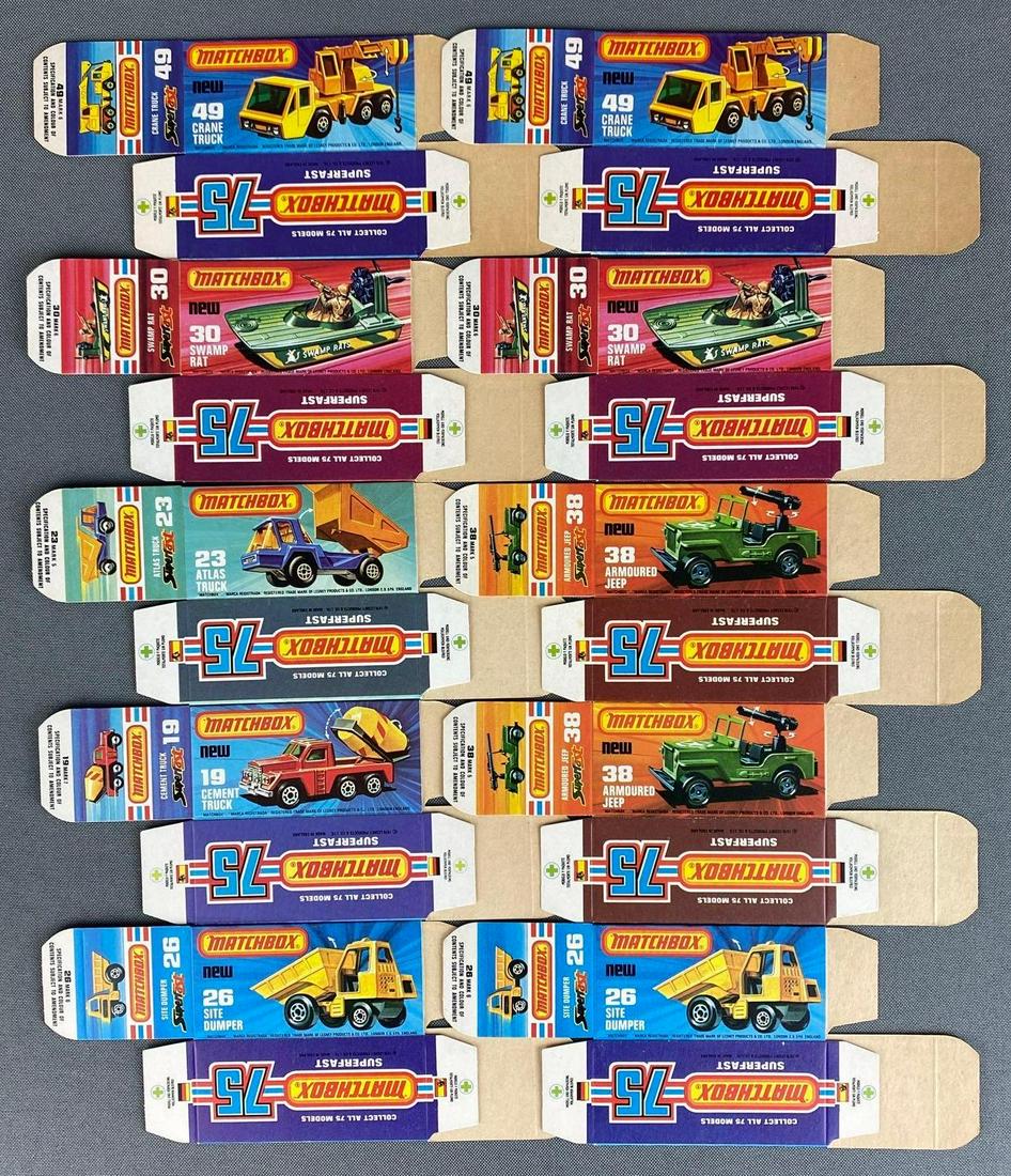 Group of 10 Matchbox Series K Type Boxes: Boxes only, a Lesney Product, made in England, includes No. 49 Crane Truck, No. 19 Cement Truck, and more.