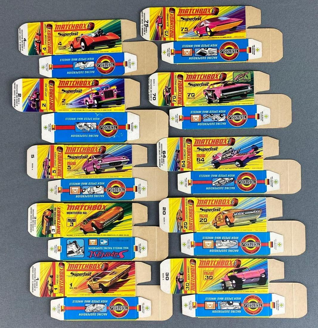 Group of 10 Matchbox Superfast Series H Type Boxes: Boxes only, 1970, a Lesney Product, made in England, includes No. 5 Lotus Europa, No. 75 Alfa Caravbo, and more.