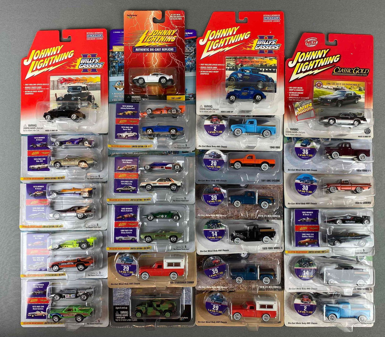Group of 24 Johnny Lightning Die Cast Vehicles: all in original packaging. includes 60s studebaker champ. 1959 el Camino, 1991 GMC syclone, 1983 hurst Oldsmobile, and more