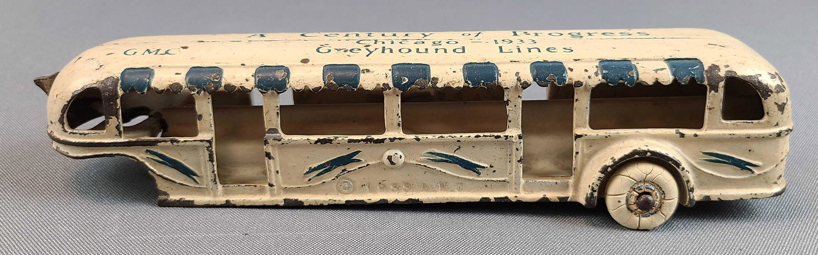 Cast Iron Century of Progress Bus: Chicago World's Fair 1933. GMC Greyhound Lines. Arcade cast iron. 9 inches long.