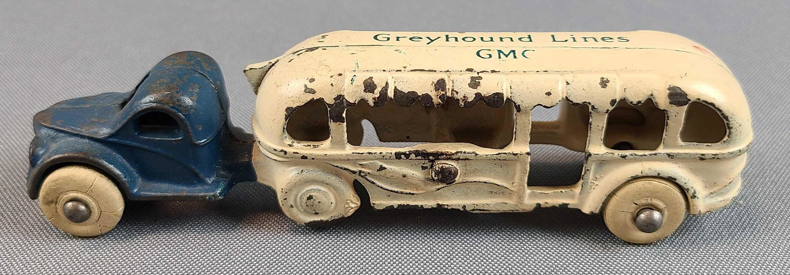 Worlds Fair Greyhound Lines GMC Shuttle Bus: Chicago World's Fair 1934. Some paint loss, 5 1/2 inches long. Arcade Cast Iron.
