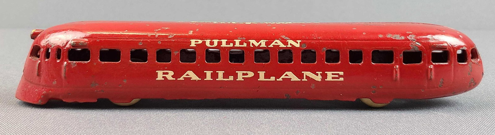 Century of Progress Pullman Railplane: Arcade Cast iron World's Fair Chicago 1934. Nice red paint, minor paint loss. 8 3/4 inches long