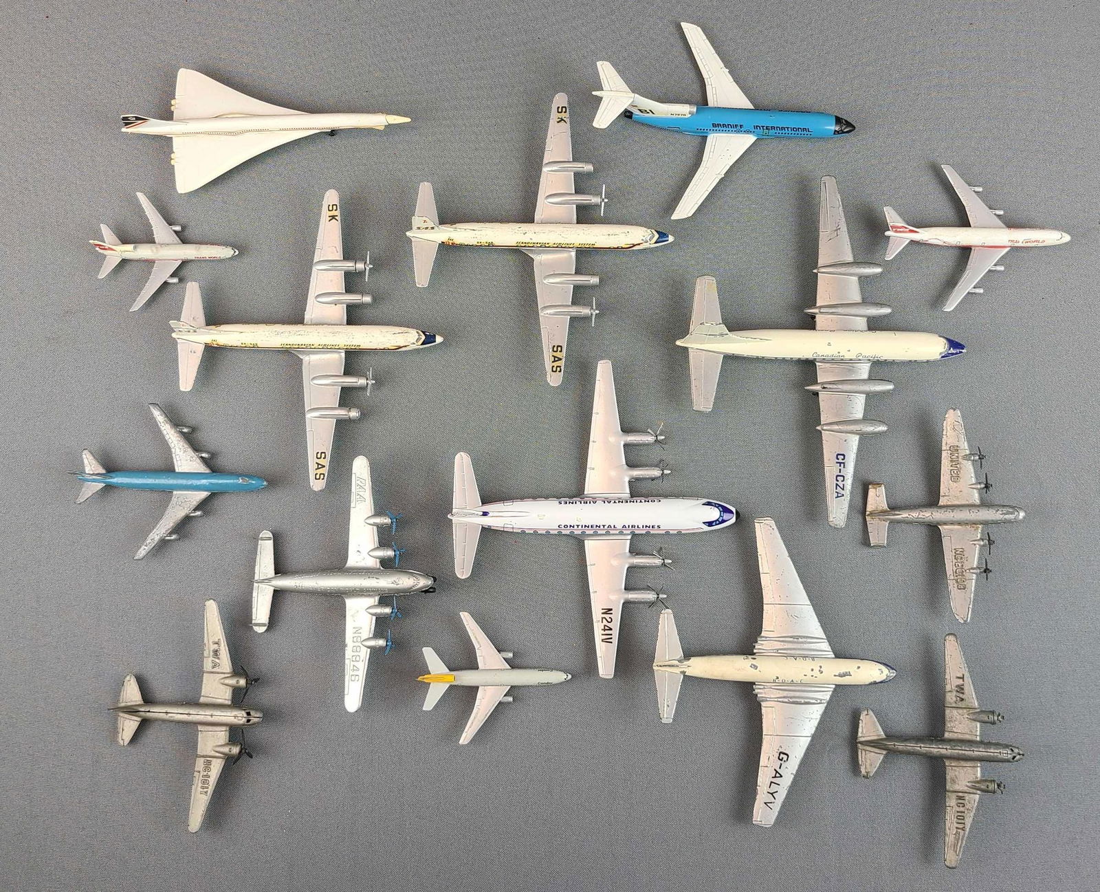 Group of 15 Toy Airplanes: Commercial jets and more. Dinky Toys, tootsietoy, Schuco, and more. Largest is 9 inches wide