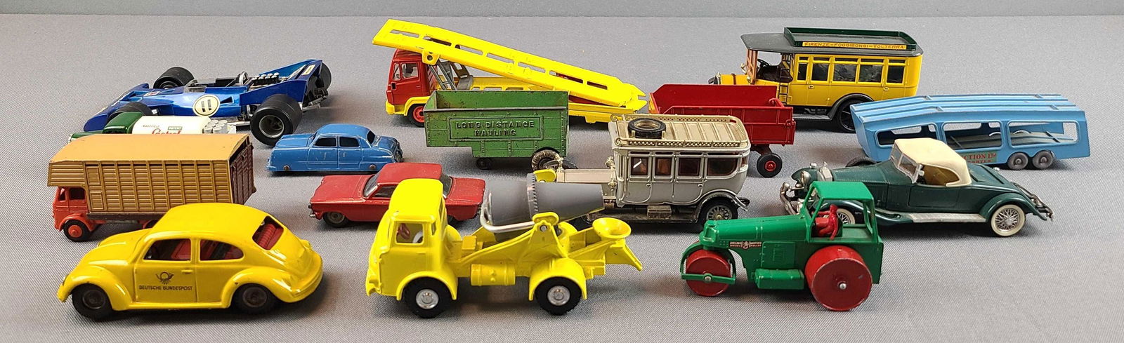 Group of 15 Die Cast Vehicles: Lesney, Rio, tootsietoy. Played with condition