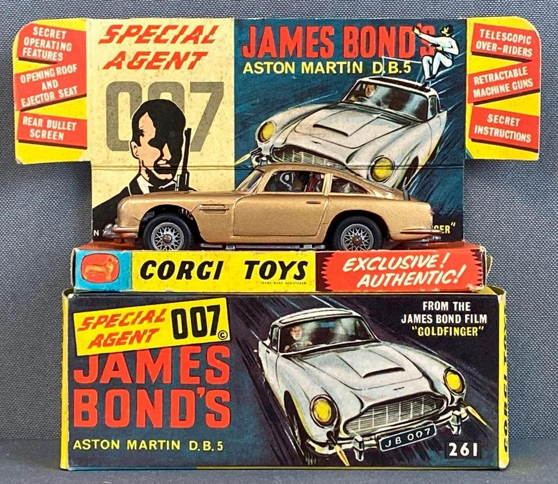 Corgi Toys James Bond Aston Martin D.B.5 Die-Cast Vehicle: 1965, with original box, made in Great Britain, No. 261, includes extra villain, front guns, bullet shield, and ejector seat all working condition , box measures 2 x 4 1/4 x 1 1/2in.